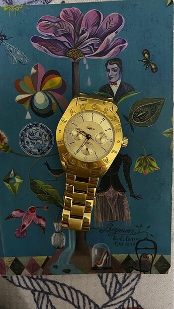Lacoste gold saat
