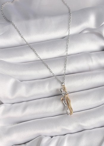 Çelik, birbirine sarılan iki insan kolye - Görsel 2