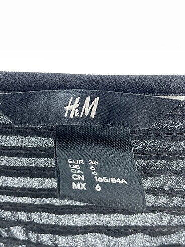36 Beden siyah Renk H&M Uzun Elbise %70 İndirimli.