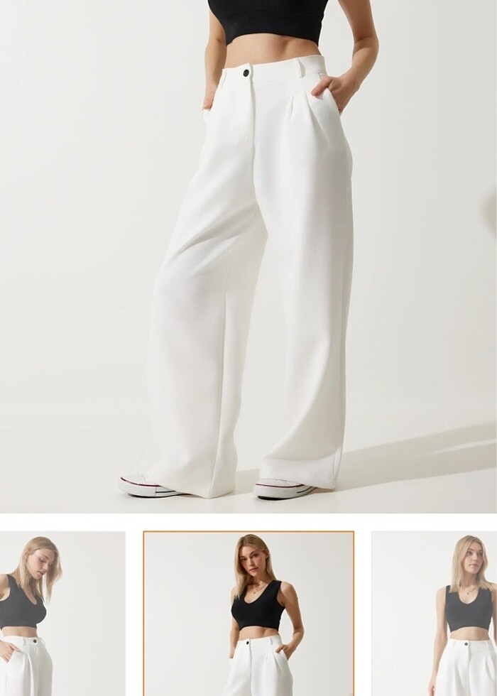 Etiketli beyaz pantolon - Görsel 2