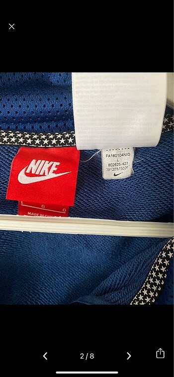 l Beden Nike ait fermuarlı ceket