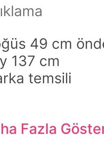 Diğer UZUN İPEKSİ BİR KUMAŞLA ŞIK ELBİSE