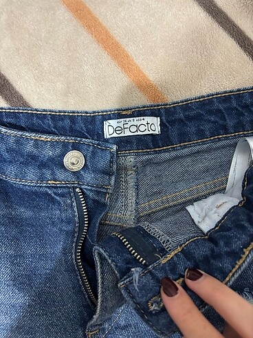 Defacto kot sort