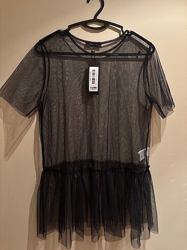 trendyolmilla transparan bluz etiketli