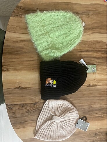 H&M bere üçlü