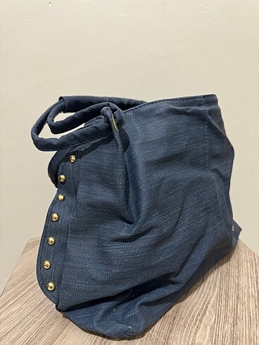 Kot görünümlü kol çantası