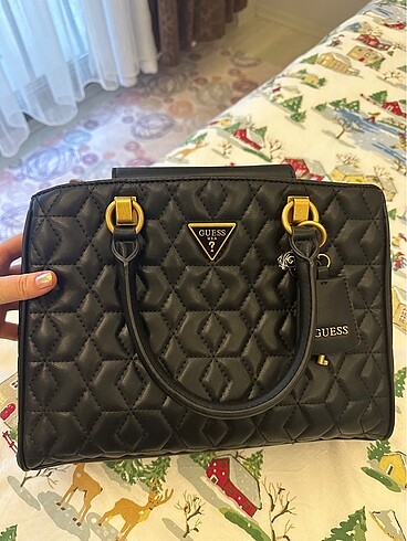 Guess canta