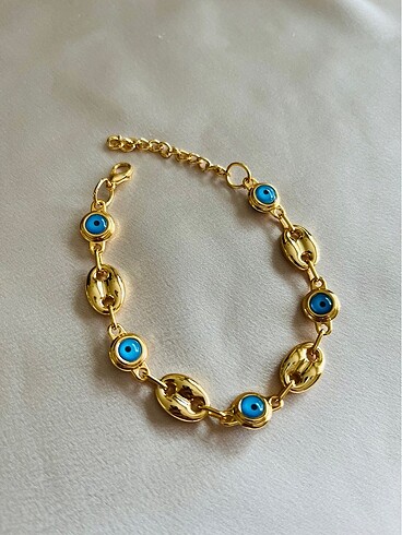 Kadın kararmaz gold göz bileklik