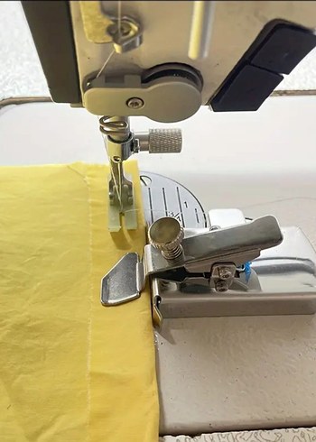 Dikiş Makinesi için kumaş tutucu