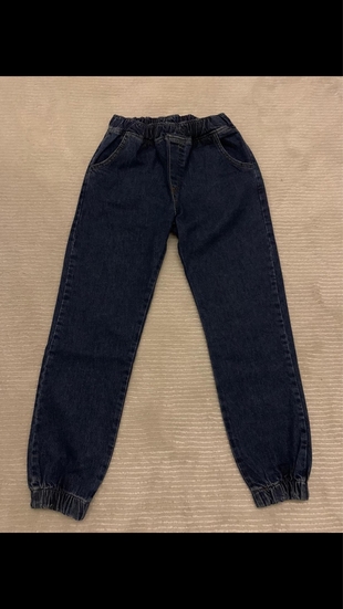Beli paçası lastikli jean