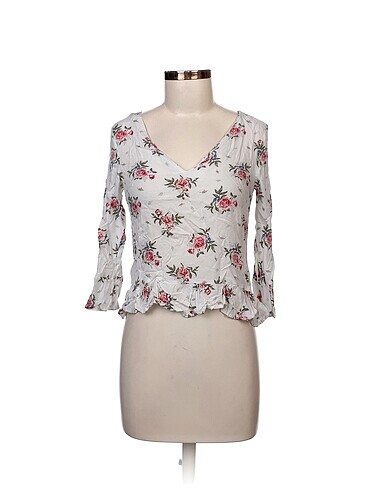 H&M Bluz %70 İndirimli.