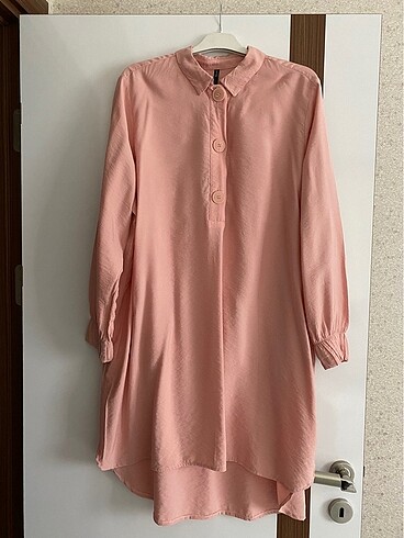 Tunik ( defacto)