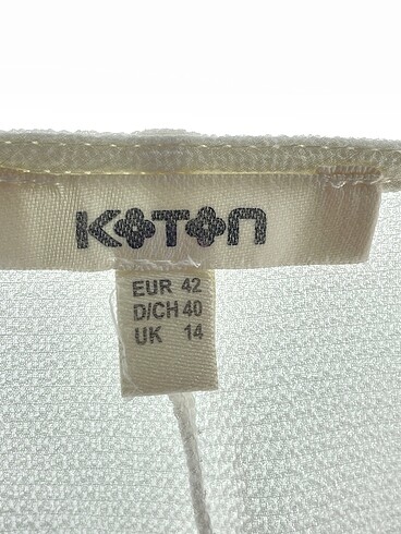 42 Beden beyaz Renk Koton Bluz %70 İndirimli.