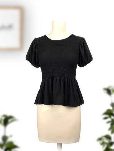 Zara Bluz %70 İndirimli.