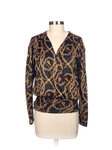 Zara Bluz %70 İndirimli.