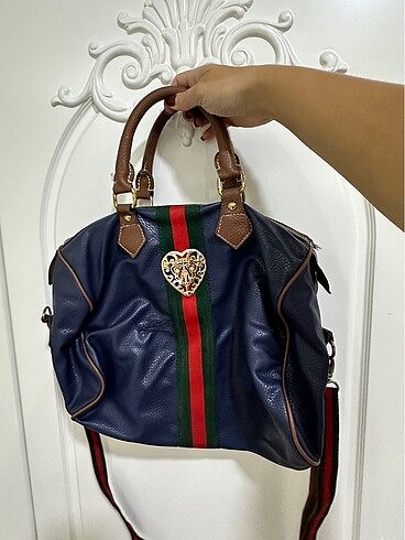 Gucci replikadır ufak bi yırtılma olmuştu zigzag yaptırdım