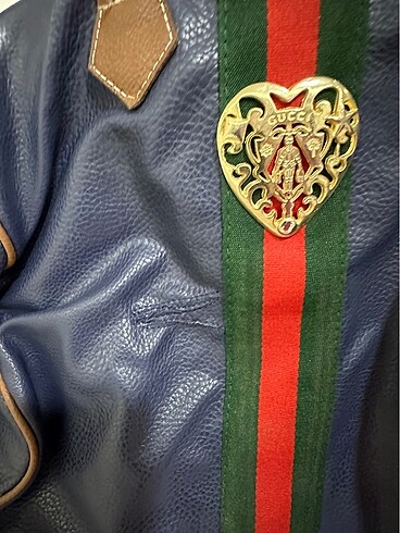 Diğer Gucci replikadır ufak bi yırtılma olmuştu zigzag yaptırdım