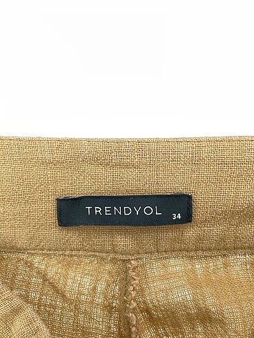 34 Beden çeşitli Renk Trendyol & Milla Kumaş Pantolon %70 İndirimli.