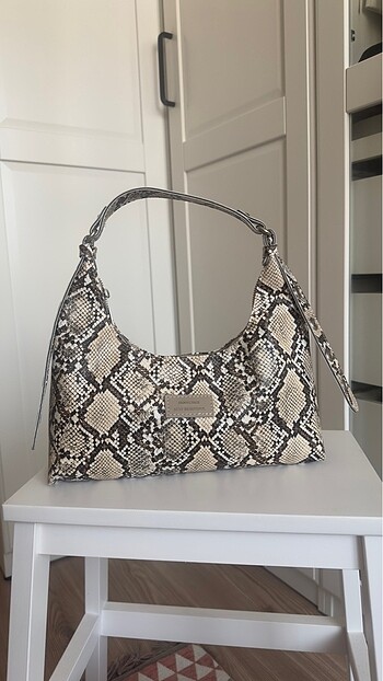 House of bags yılan derisi kol çantası