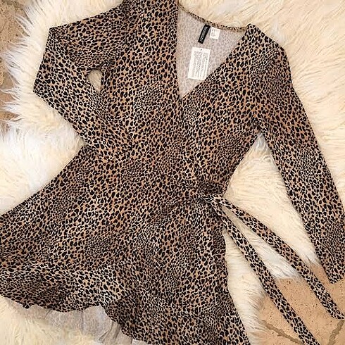 H&M leopar print wrap elbise. 38 beden fakat 36 uyumlu sayılır.