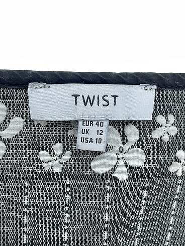 40 Beden çeşitli Renk Twist Mini Etek %70 İndirimli.