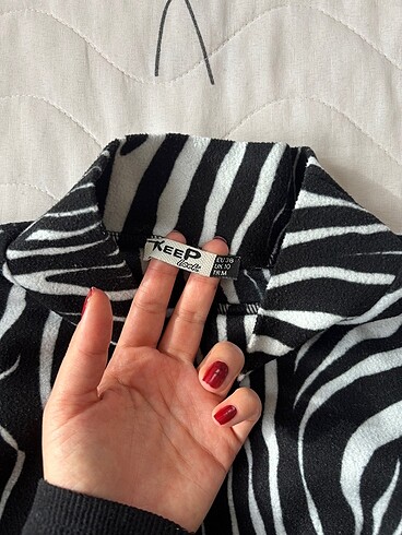 H&M Zebra desenli bluz