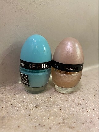 Sephora collection mavi ve ışıltılı krem rengi oje,hiç kullanılm