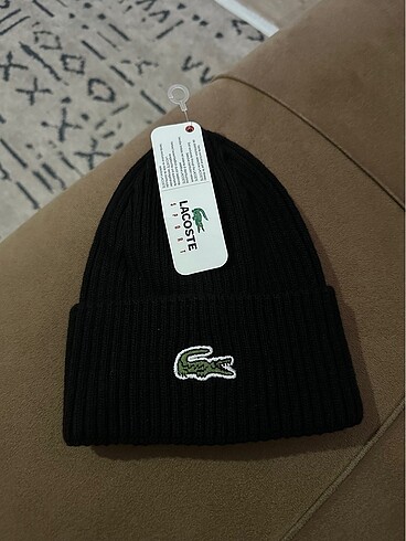 Lacoste bere