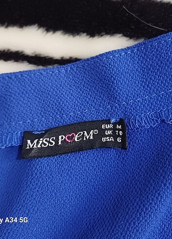 Miss Poem Kolları ve etekleri volanlı saks mavisi abiye bluz