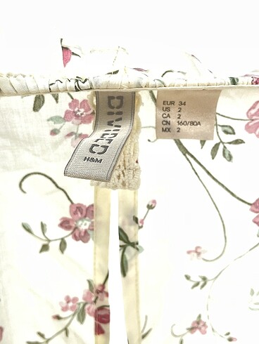34 Beden çeşitli Renk H&M Bluz %70 İndirimli.
