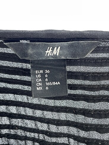 36 Beden siyah Renk H&M Uzun Elbise %70 İndirimli.