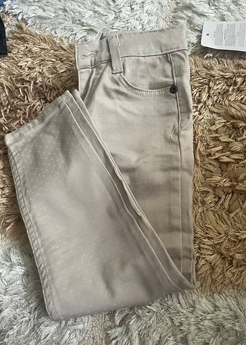 Bej kız çocuk desenli pantolon