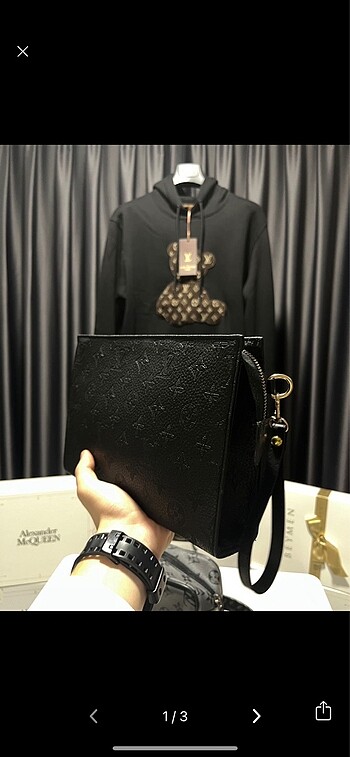 Louis Vuitton clutch çanta