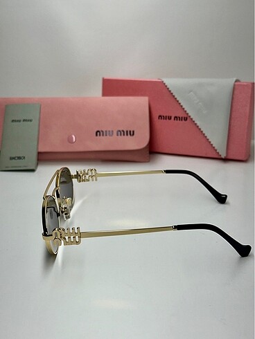 Miu Miu SMU54ZS FE03S 53 Ekartman