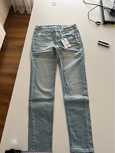 Likralı ağartılmış açık mavi skin jean