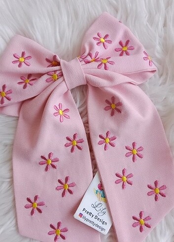 Pembe papatyali toka 