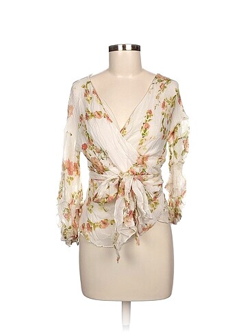 Zara Bluz %70 İndirimli.