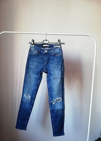 Mavi yırtık skinny jean