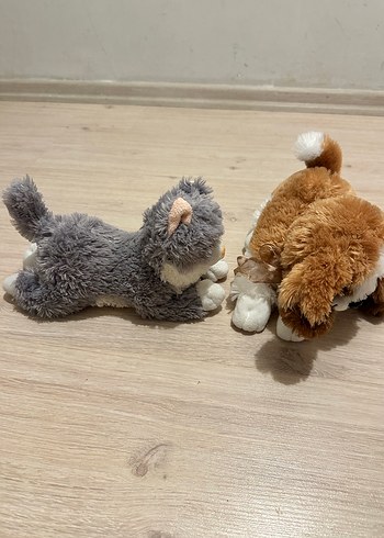 Kahverengi köpek ve gri peluş oyuncak - Görsel 2