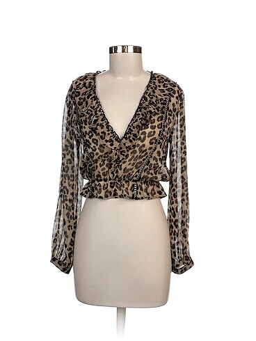 Zara Bluz %70 İndirimli.