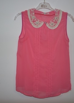 Sıfır kollu pembe bluz