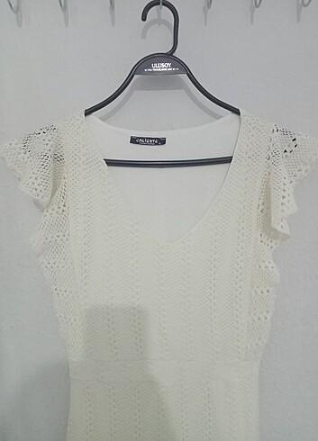 Krem renkli pileli elbise  - Görsel 4