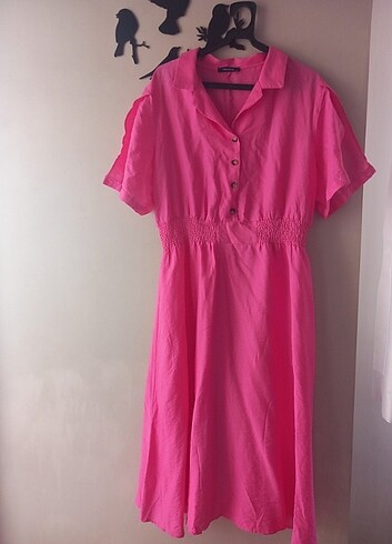Pembe elbise