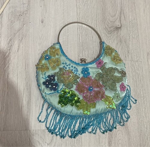 American vintage pullu kol çantası