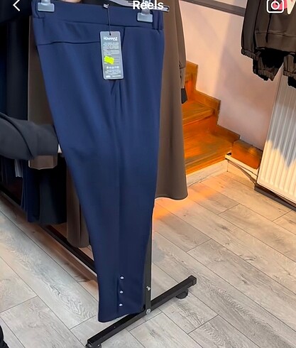 Paçası zımba model beli lastikli kumaş pantolon