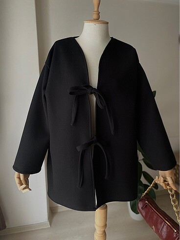 Viral model bağlamalı kaşe kaban