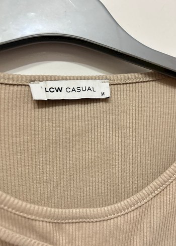 Bej Uzun Kollu Bluz alt dikişleri biraz söküldüğü için uyguna - Görsel 2