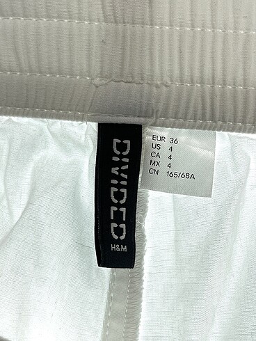 36 Beden beyaz Renk H&M Kumaş Pantolon %70 İndirimli.