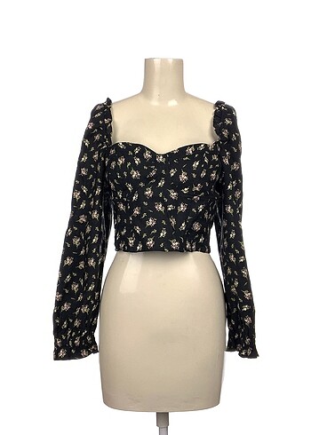 H&M Bluz %70 İndirimli.