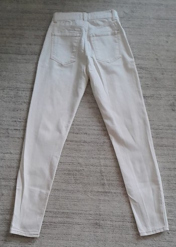 ekruya bakan tonlarda denim pantolon. - Görsel 4
